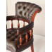Кабинетное кресло с коричневой обивкой