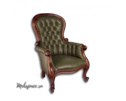 Кресло с зеленой кожей